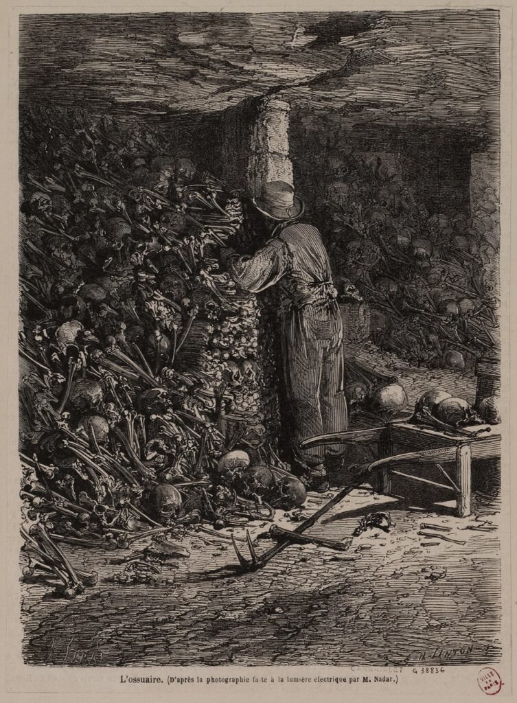 Historic photograph of a gallery in the Paris Catacombs lined with stacked bones and skulls.