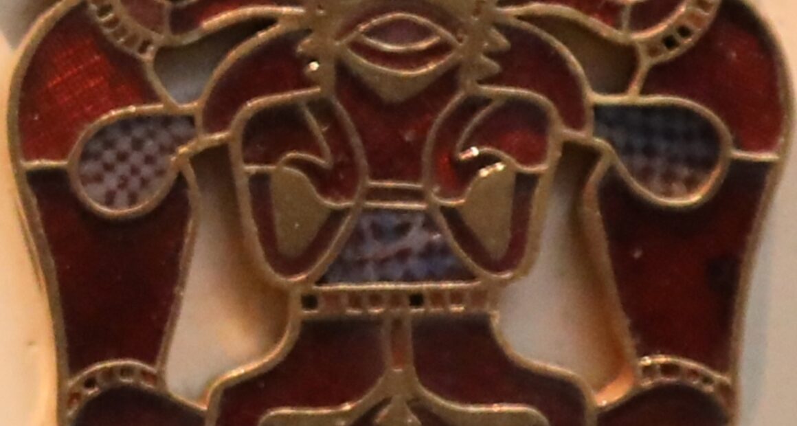 Gold and garnet purse lid from the Sutton Hoo ship burial, displayed in the British Museum.