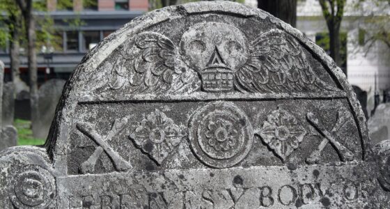 Slate gravestone with a carved winged skull, Granary Burying Ground, Boston.